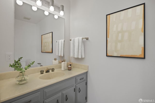 bathroom featuring vanity and visible vents