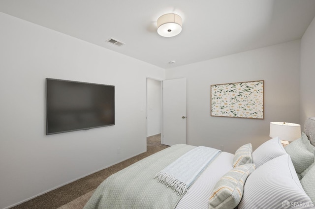 bedroom featuring visible vents and carpet