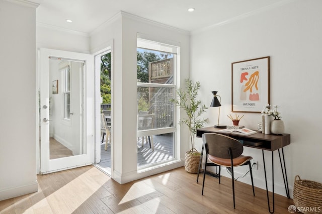 entryway featuring crown molding, wood finished floors, and recessed lighting