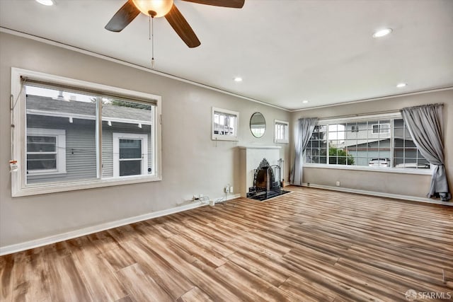 2830 Parker Ave, Oakland, CA 94605 - unfurnished living room featuring wood finished floors, ceiling fan, recessed lighting, and ornamental molding