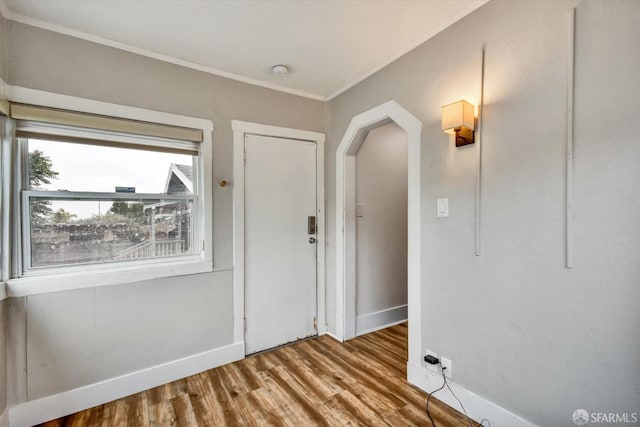 2830 Parker Ave, Oakland, CA 94605 - entrance foyer featuring wood finished floors, crown molding, and arched walkways