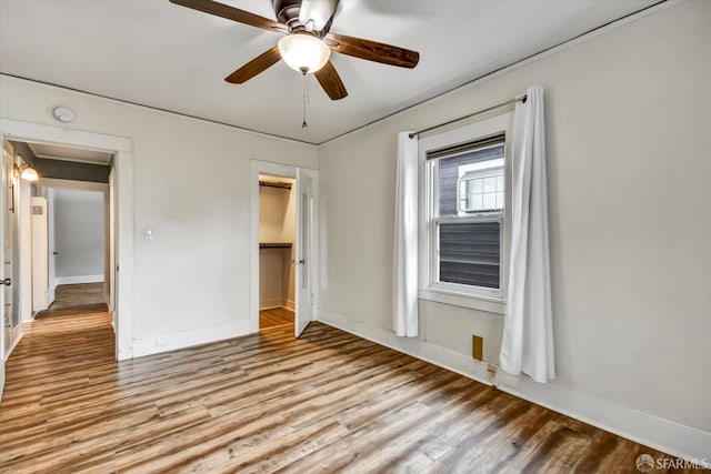 2830 Parker Ave, Oakland, CA 94605 - unfurnished bedroom featuring light wood-style floors, a ceiling fan, and a closet