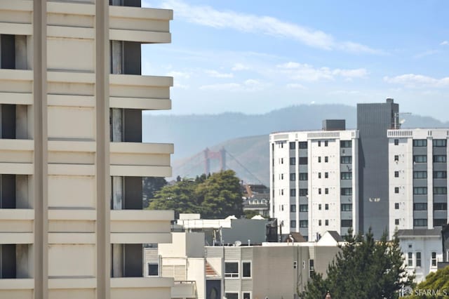 view of building exterior with a mountain view