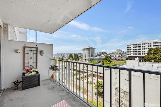 balcony featuring a view of city
