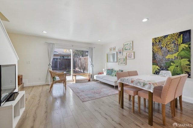 dining space featuring light hardwood / wood-style flooring