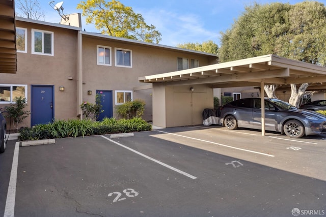 view of car parking featuring a carport