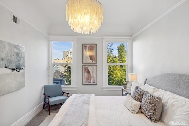 bedroom with baseboards, ornamental molding, visible vents, and an inviting chandelier