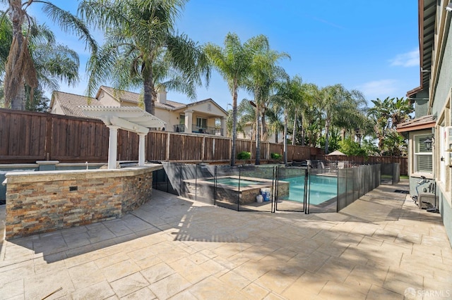 view of swimming pool with a fenced in pool, a fenced backyard, a pergola, an in ground hot tub, and a patio