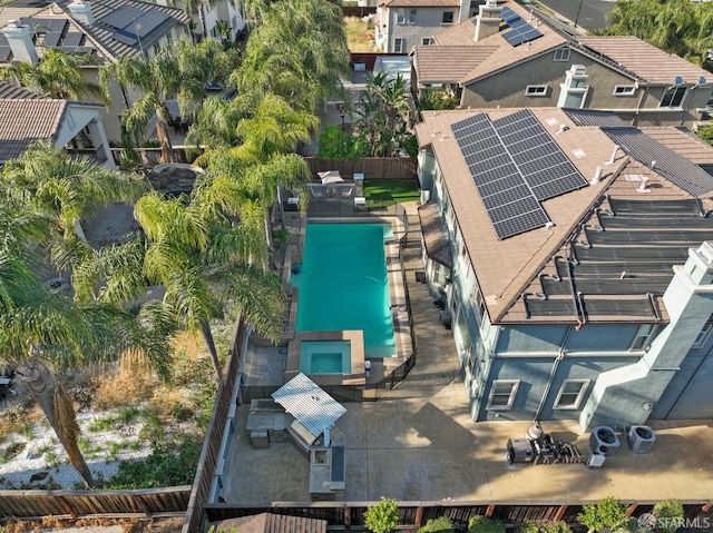 birds eye view of property with a residential view