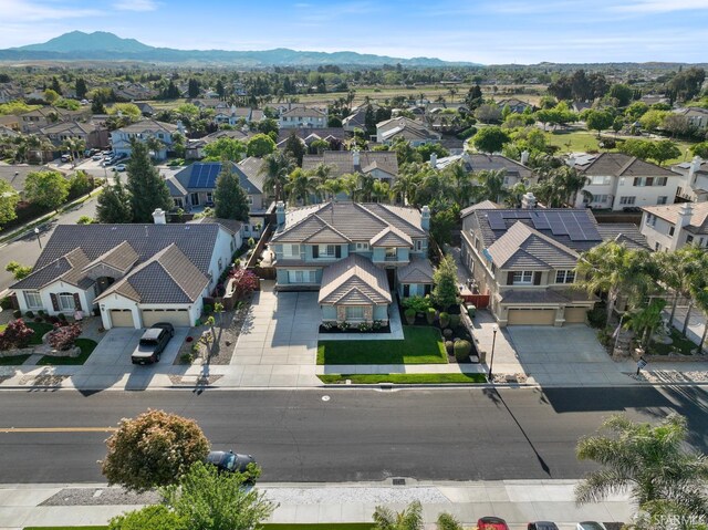 aerial view with a residential view and a mountain view