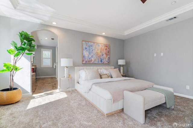 carpeted bedroom with recessed lighting, visible vents, crown molding, and baseboards
