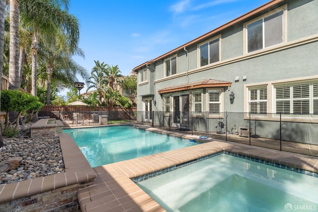 view of swimming pool with a fenced backyard, a fenced in pool, and a patio