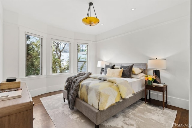 bedroom featuring hardwood / wood-style floors