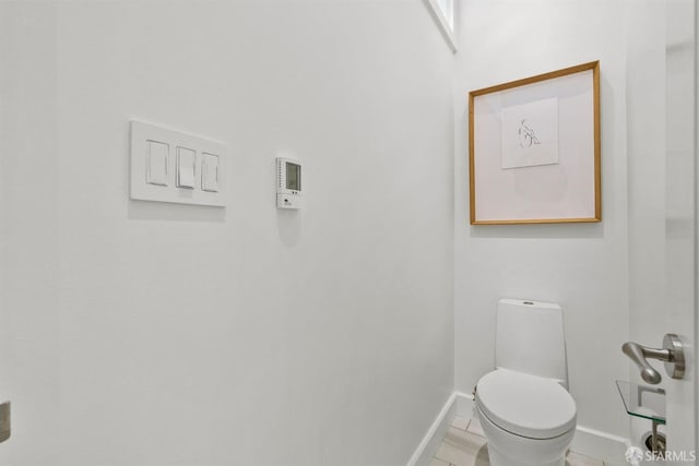 bathroom featuring toilet