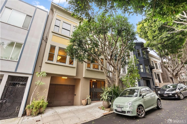 view of property with a garage