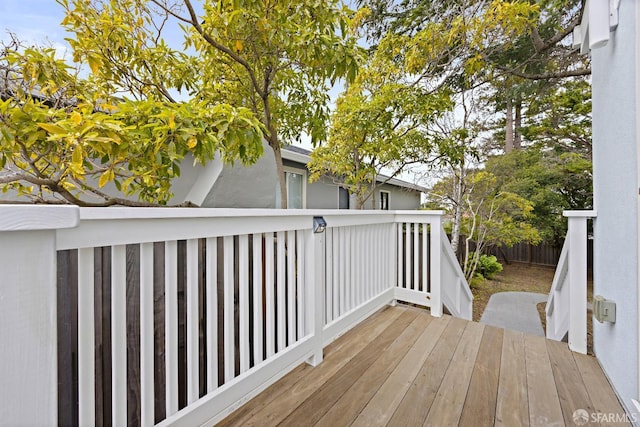 wooden deck featuring fence