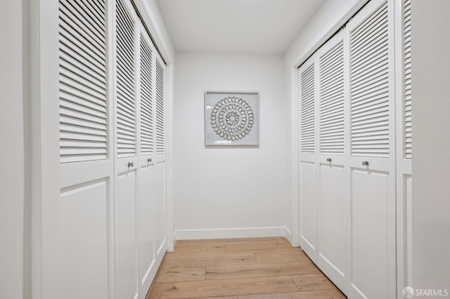 170 King St Unit 1006, San Francisco, CA 94107 - hallway with light wood-type flooring and baseboards
