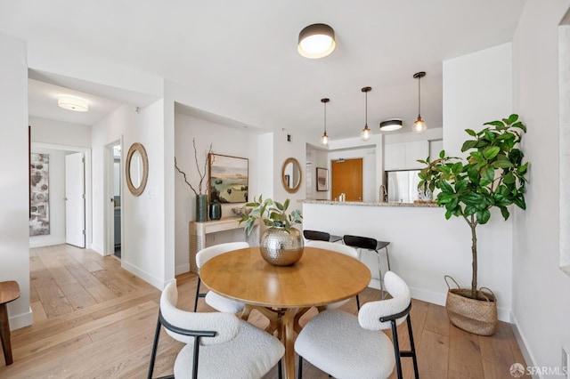170 King St Unit 1006, San Francisco, CA 94107 - dining space with light wood finished floors and baseboards