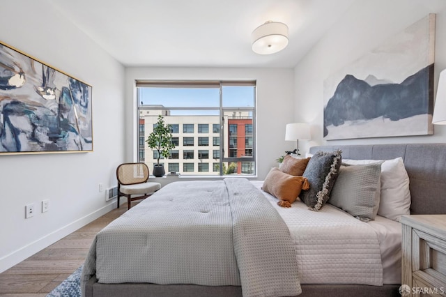 170 King St Unit 1006, San Francisco, CA 94107 - bedroom featuring wood finished floors and baseboards