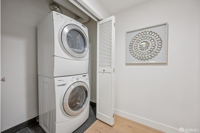 170 King St Unit 1006, San Francisco, CA 94107 - laundry area with stacked washer / drying machine and wood finished floors