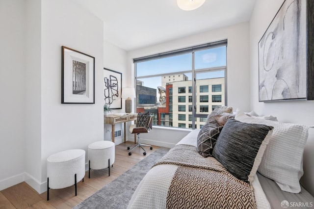 170 King St Unit 1006, San Francisco, CA 94107 - bedroom featuring wood finished floors and a desk