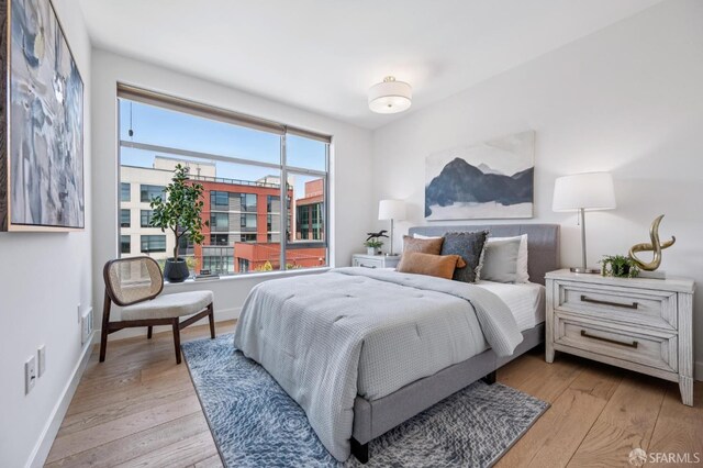 170 King St Unit 1006, San Francisco, CA 94107 - bedroom with light wood-type flooring