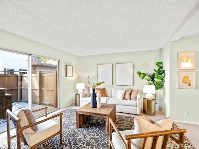 living room with carpet and a textured ceiling