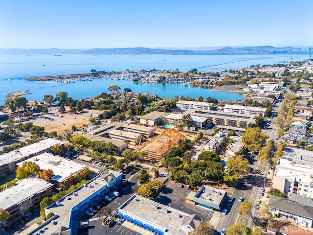 bird's eye view featuring a water and mountain view