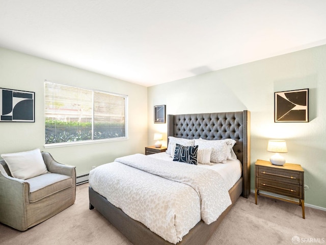 bedroom featuring baseboard heating and light colored carpet