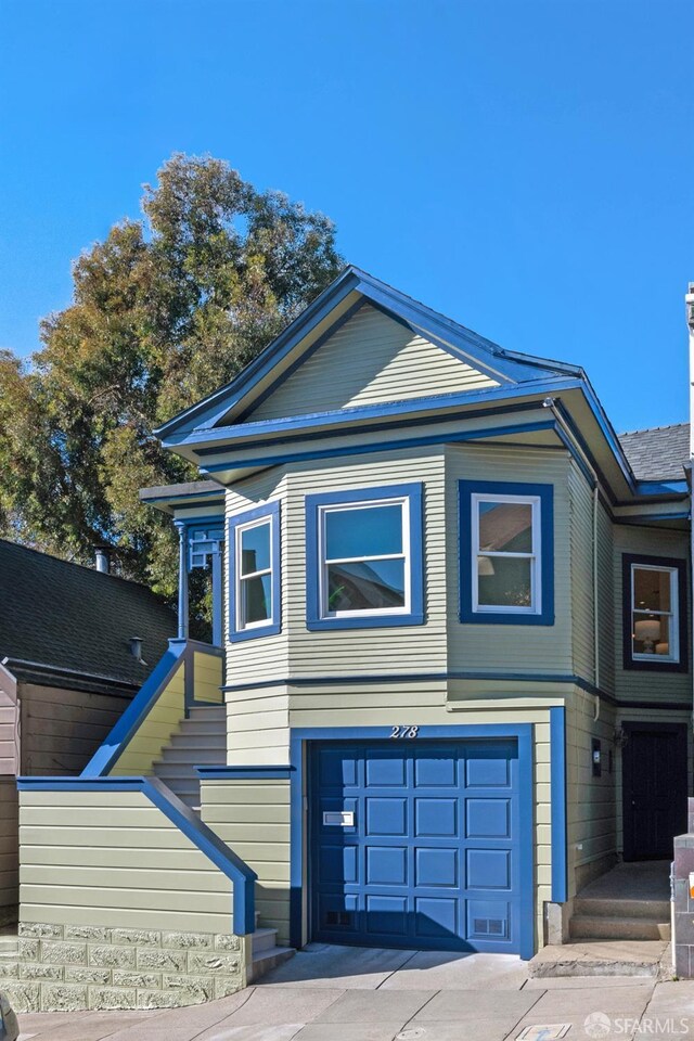 view of front of home featuring a garage