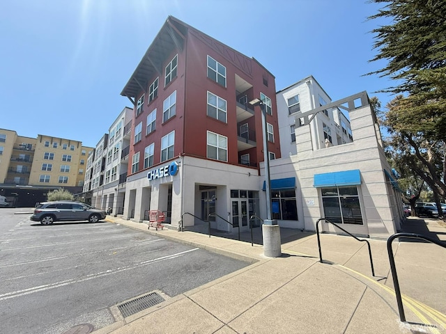 8100 Oceanview Ter Unit 117, San Francisco, CA 94132 - view of apartment building / complex with uncovered parking