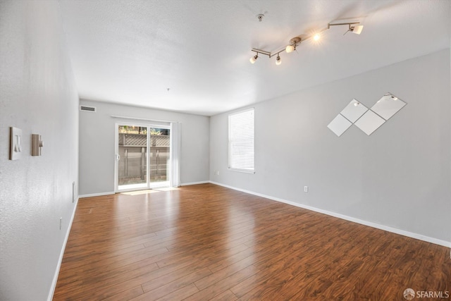8100 Oceanview Ter Unit 117, San Francisco, CA 94132 - unfurnished room featuring baseboards and wood finished floors