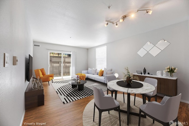 8100 Oceanview Ter Unit 117, San Francisco, CA 94132 - dining space with light wood-style floors and baseboards