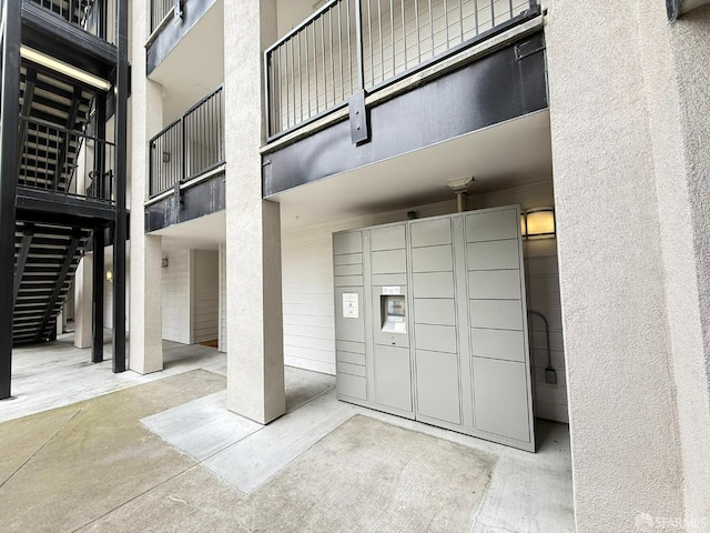 8100 Oceanview Ter Unit 117, San Francisco, CA 94132 - view of community with a package area and stairs