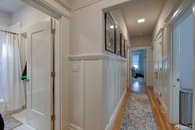 corridor featuring light hardwood / wood-style flooring