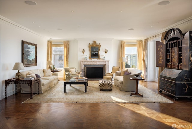 living room with ornamental molding and parquet flooring