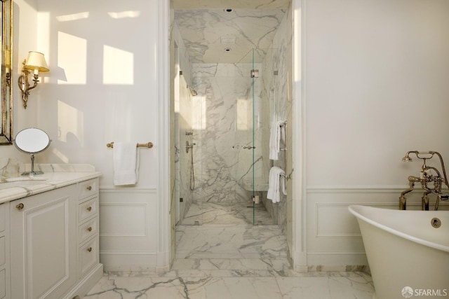 bathroom featuring vanity and shower with separate bathtub