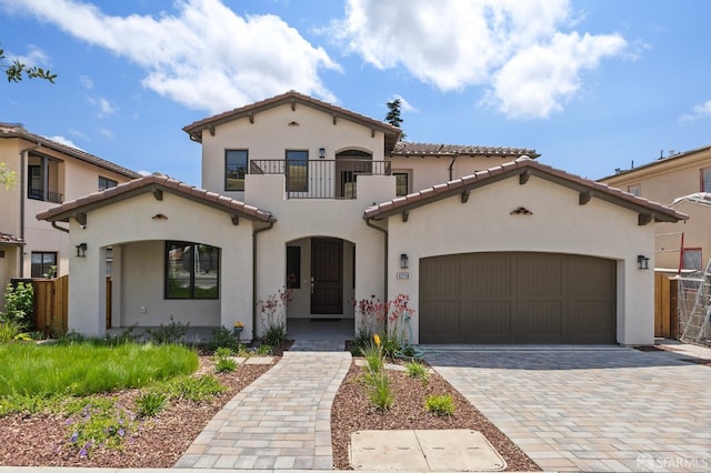 42119 Vinha Way, Fremont, CA 94539 - mediterranean / spanish-style house featuring stucco siding, a tiled roof, an attached garage, and a balcony