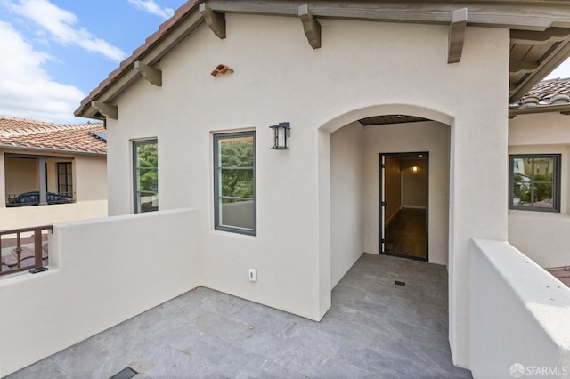 42119 Vinha Way, Fremont, CA 94539 - property entrance featuring stucco siding and a tiled roof