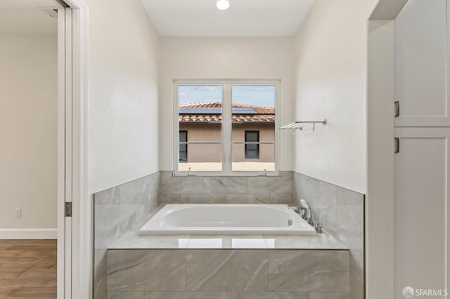 42119 Vinha Way, Fremont, CA 94539 - full bath with a bath, wood finished floors, and baseboards