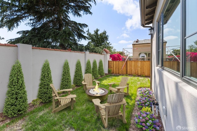 42119 Vinha Way, Fremont, CA 94539 - fenced backyard with an outdoor fire pit