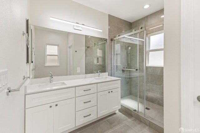 42119 Vinha Way, Fremont, CA 94539 - bathroom with plenty of natural light, double vanity, a shower stall, and recessed lighting