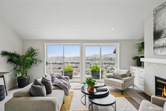 850 Pointe Pacific Dr Unit 4, Daly City, CA 94014 - living area with healthy amount of natural light, a fireplace, and recessed lighting