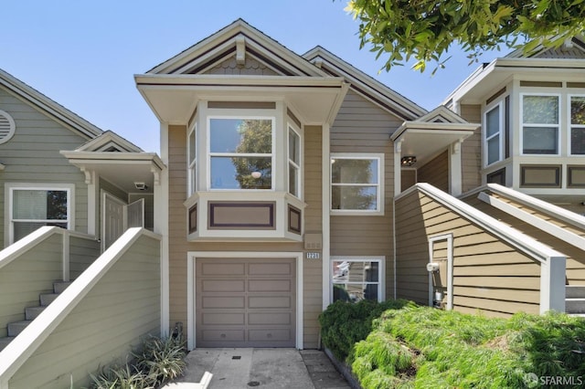 view of front of property with a garage