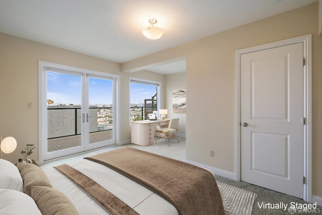 bedroom featuring carpet floors and access to exterior