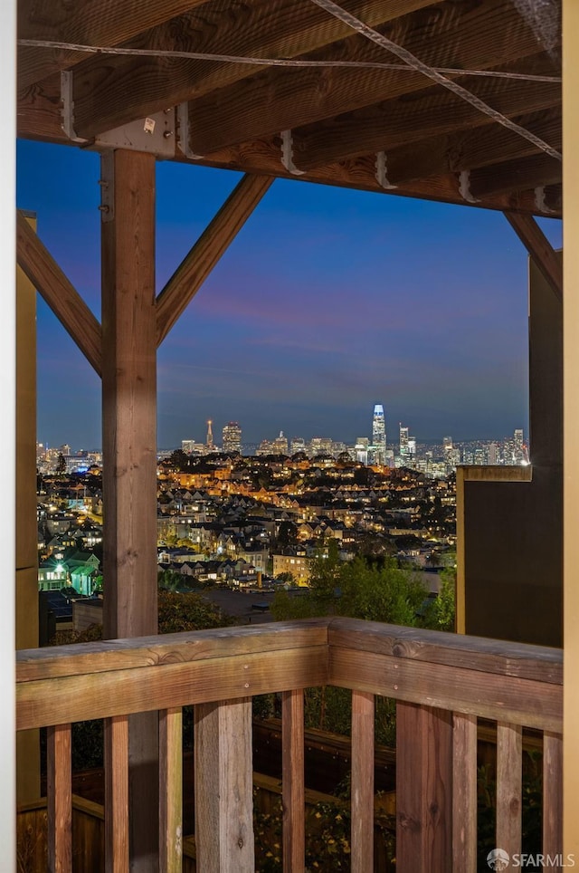 view of balcony at dusk