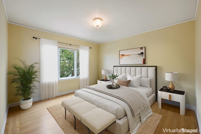 bedroom with light wood-type flooring