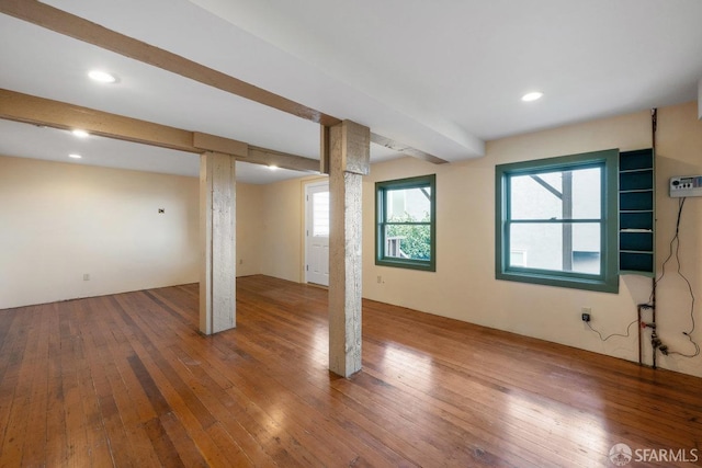 basement featuring wood-type flooring