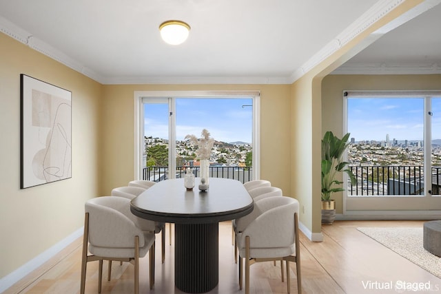 dining area featuring ornamental molding