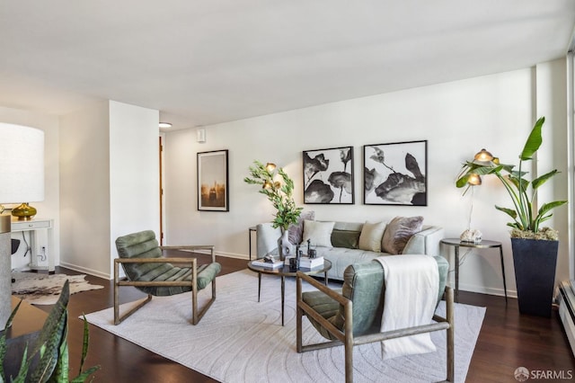 living room featuring dark hardwood / wood-style floors and a baseboard radiator